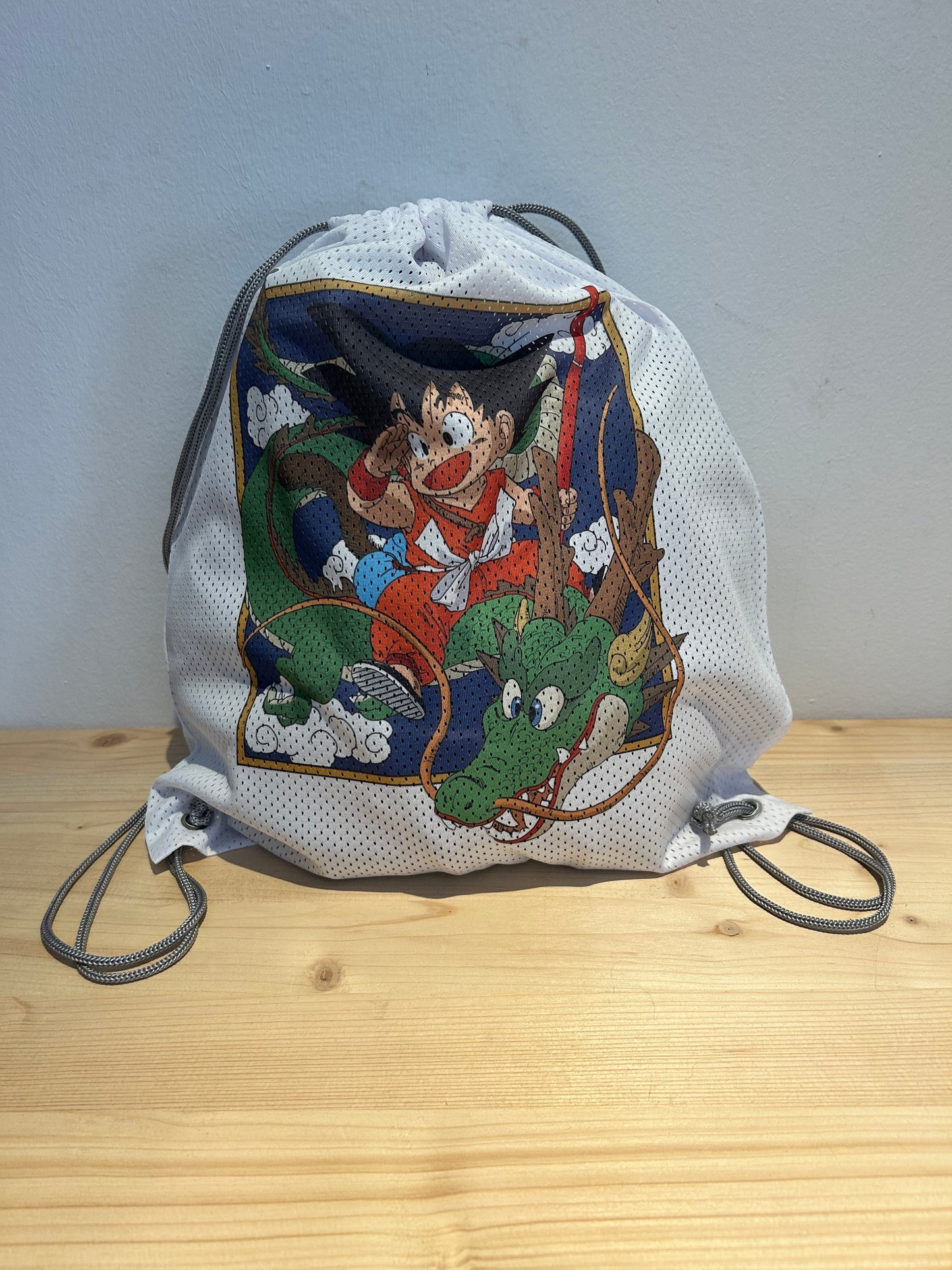 Mochila tipo saco Dragon Ball – Edición Goku & Shenlong